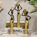 Ethnic art decor depicting women with water jugs on heads