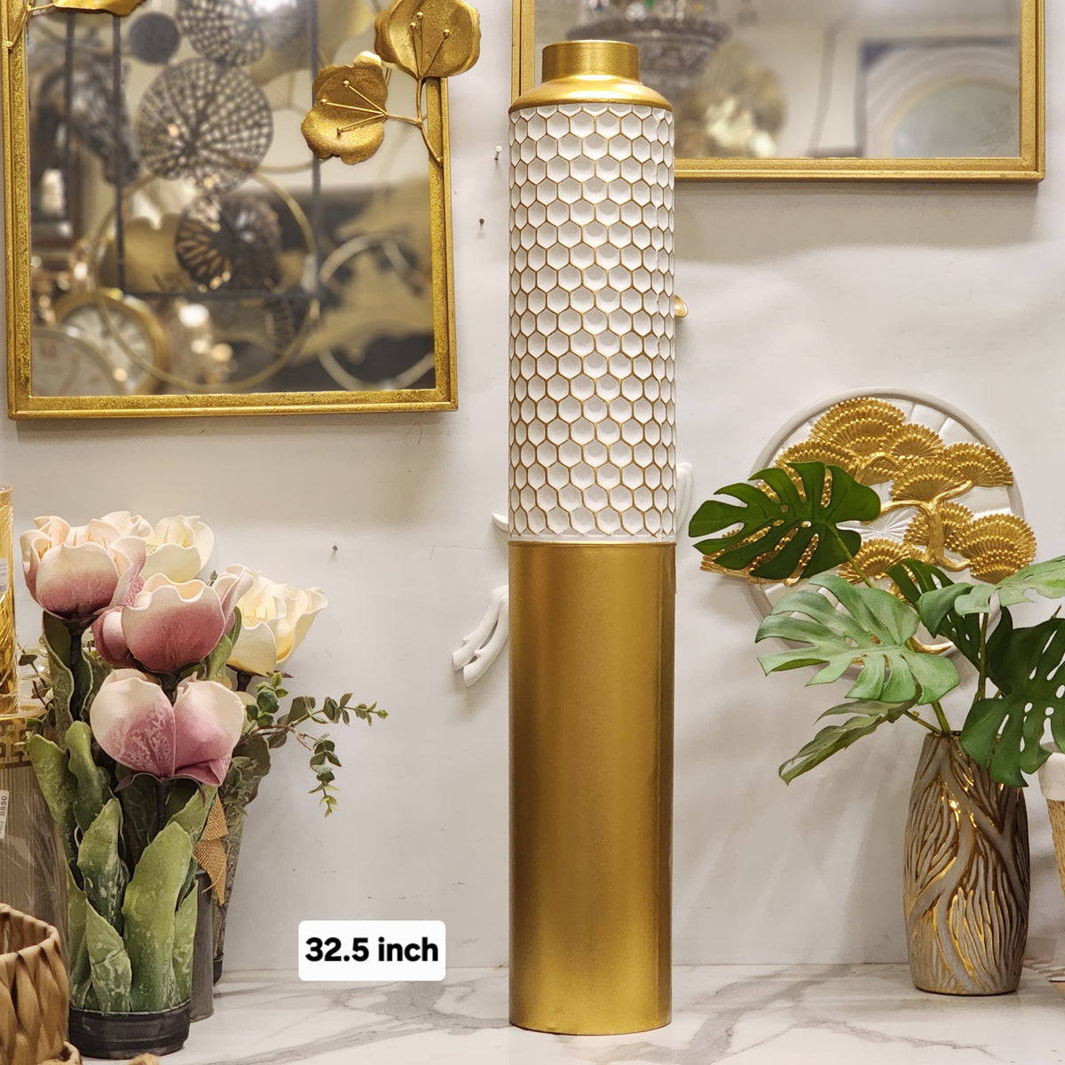 white and gold metallic floor vases