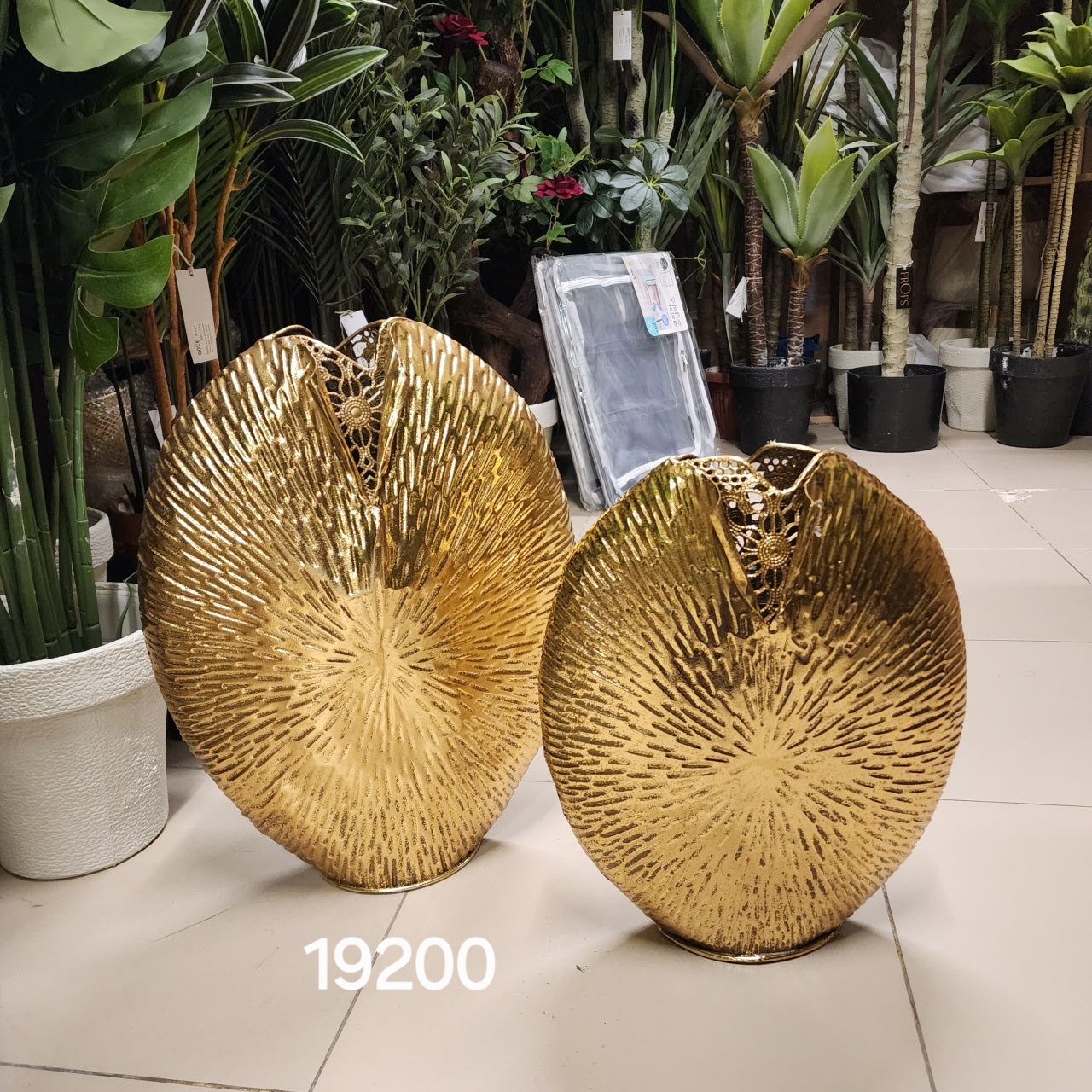 gold-finished leaf-shaped metal vases