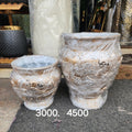 decorative urn-style planters.