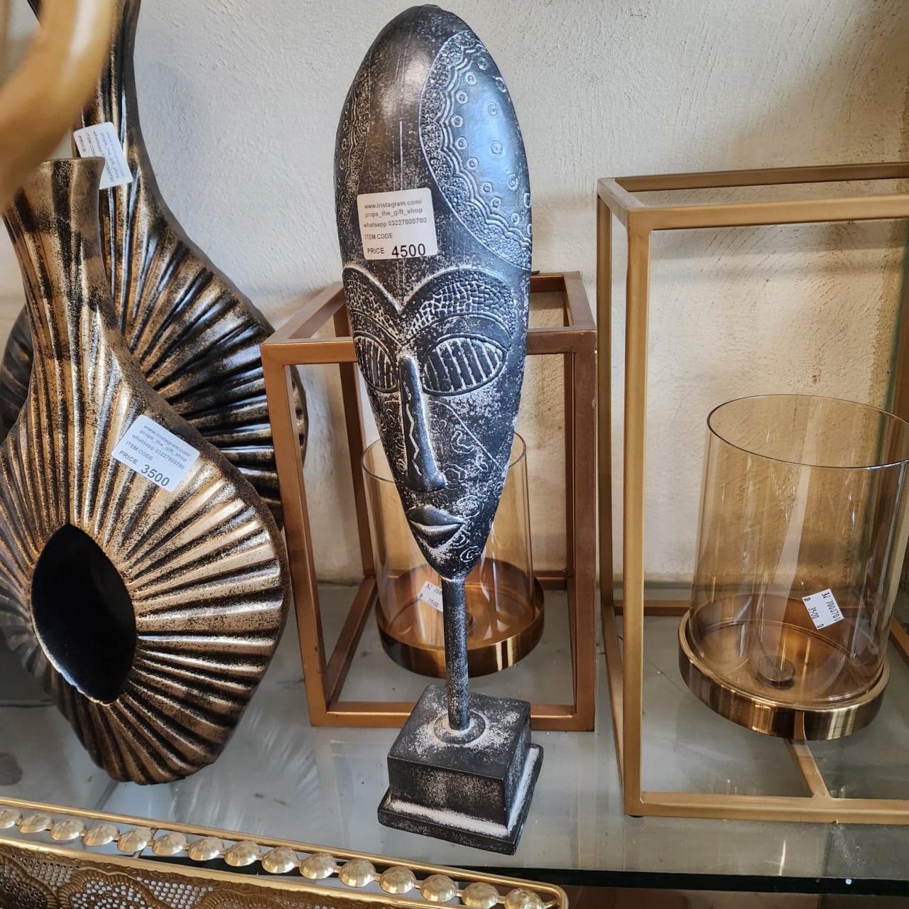African Tribal Mask Sculpture on a Stand