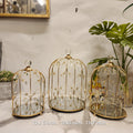 decorative gold wire birdcages with mirrored bases and crystal accents
