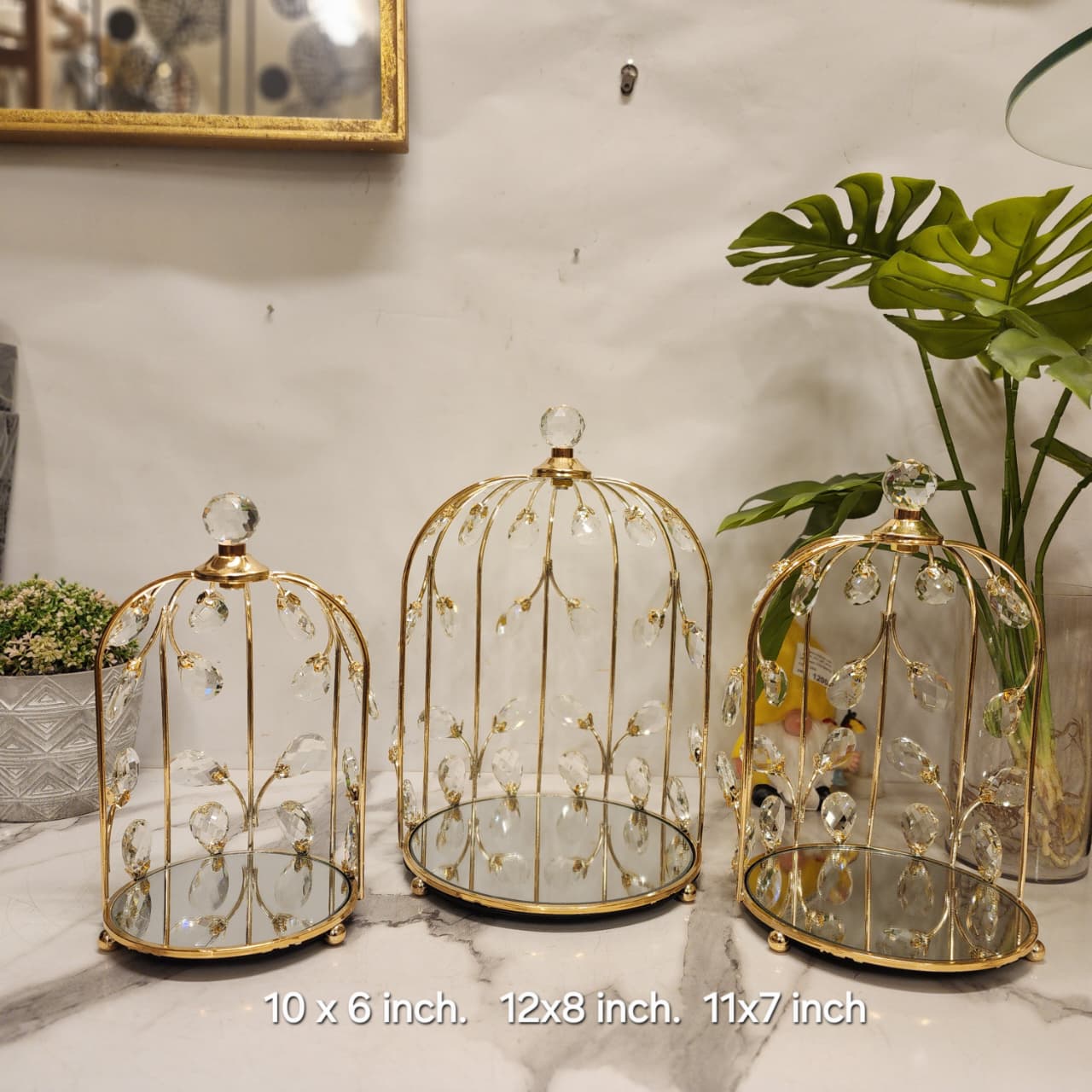 decorative gold wire birdcages with mirrored bases and crystal accents