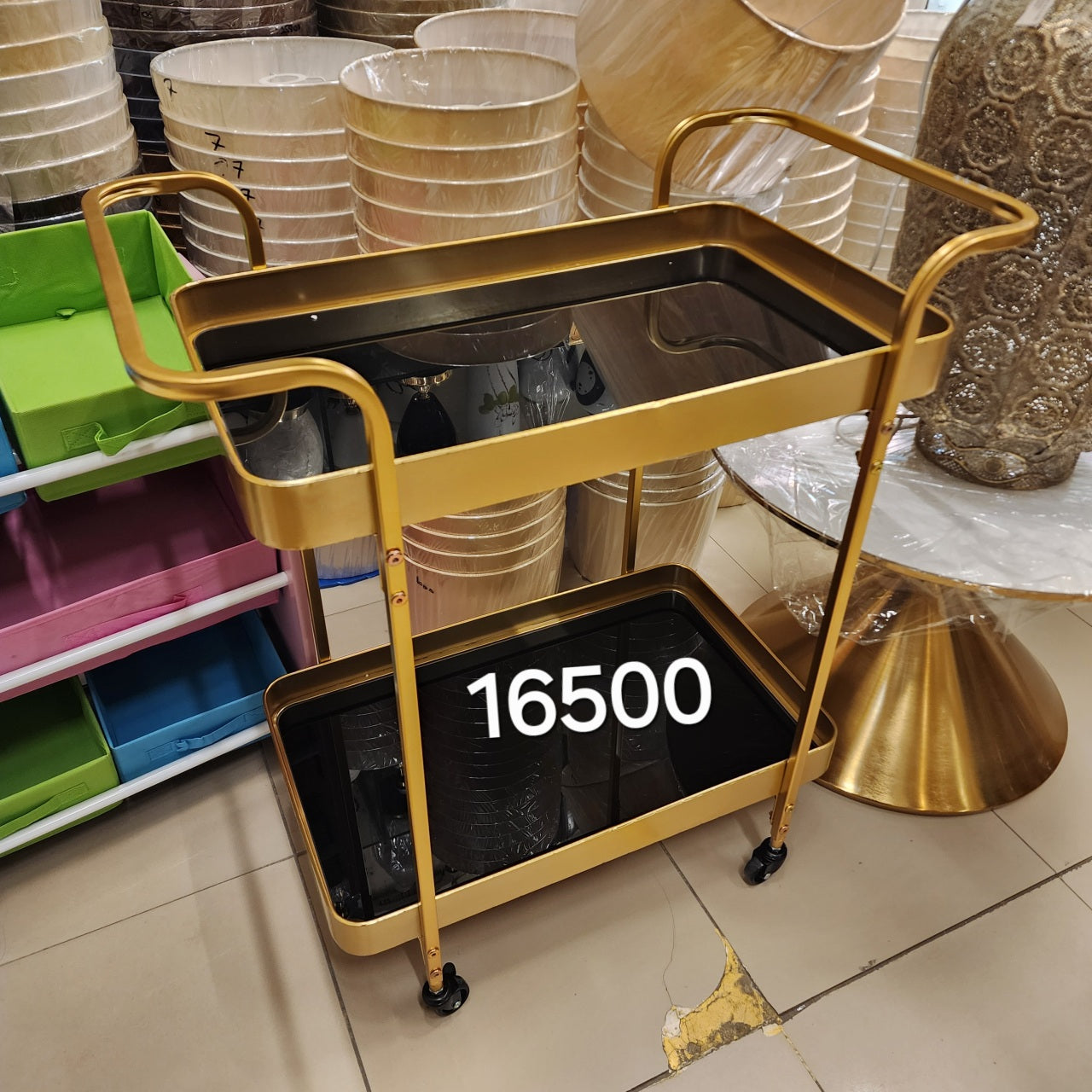 gold-finished serving trolley