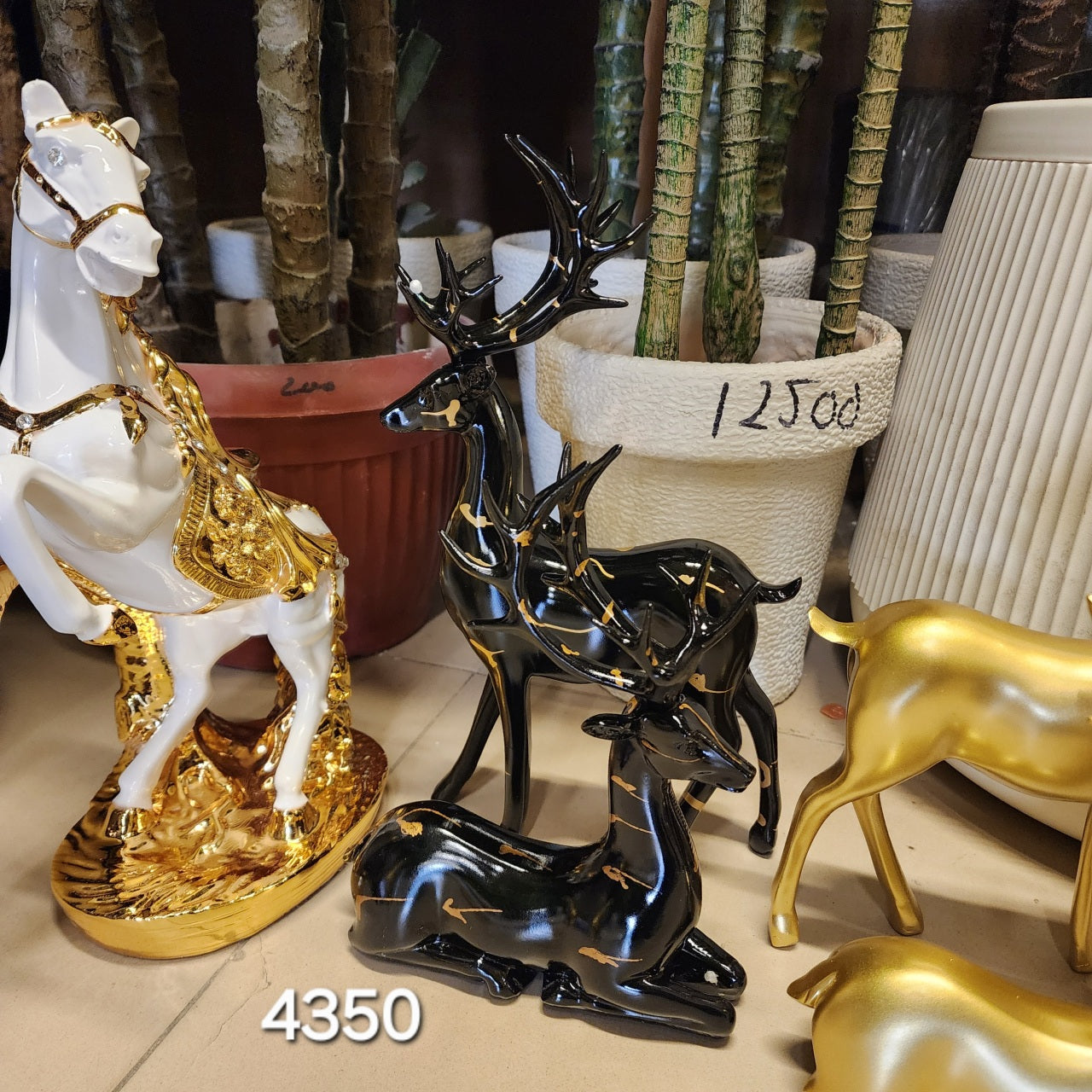 Black and Gold Reindeer Figurine Set