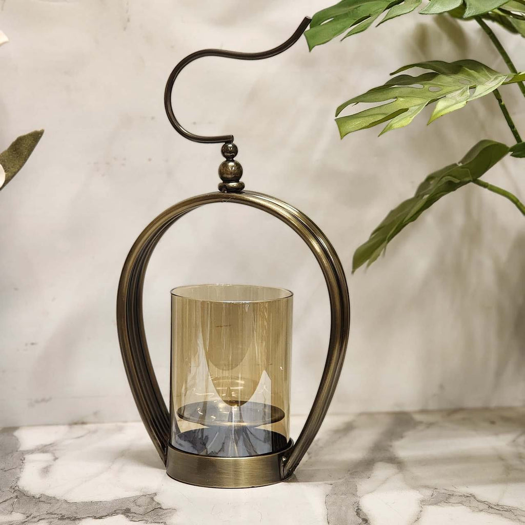 Modern Curved Metal Candle Stand with Amber Glass Hurricane