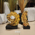 Gold Feather Sculpture with Black Base