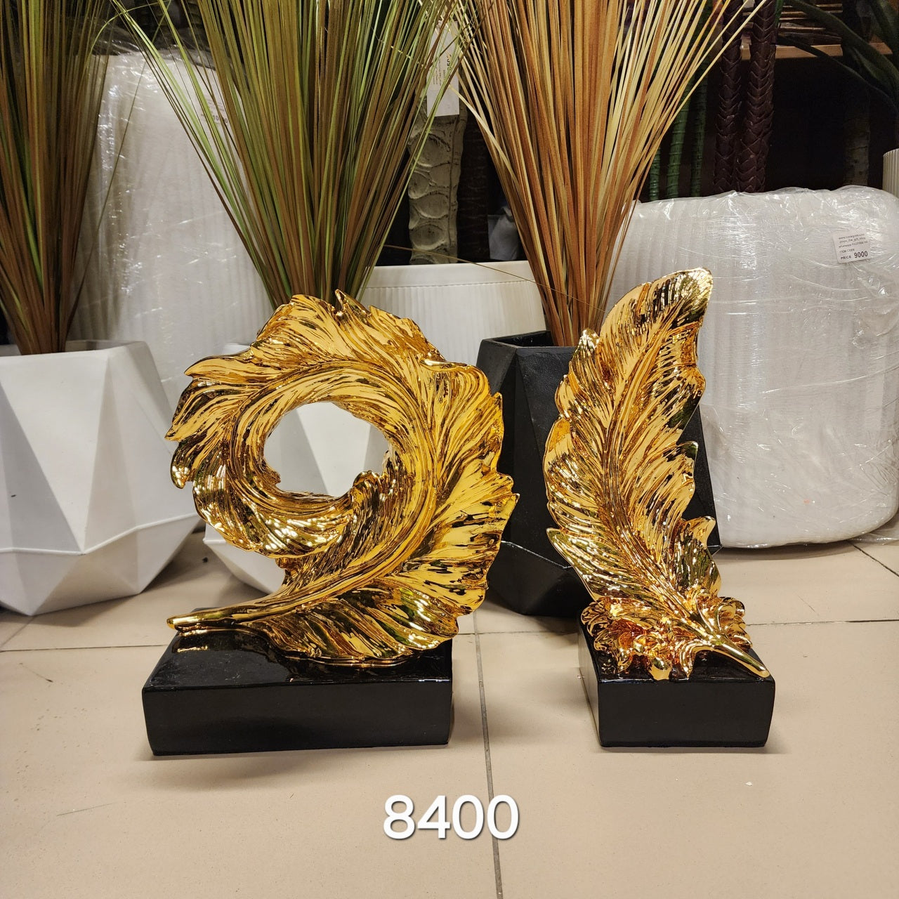 Gold Feather Sculpture with Black Base
