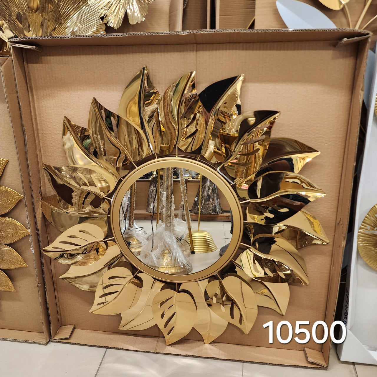 Gold Metal Monstera Leaf Wall Mirror
