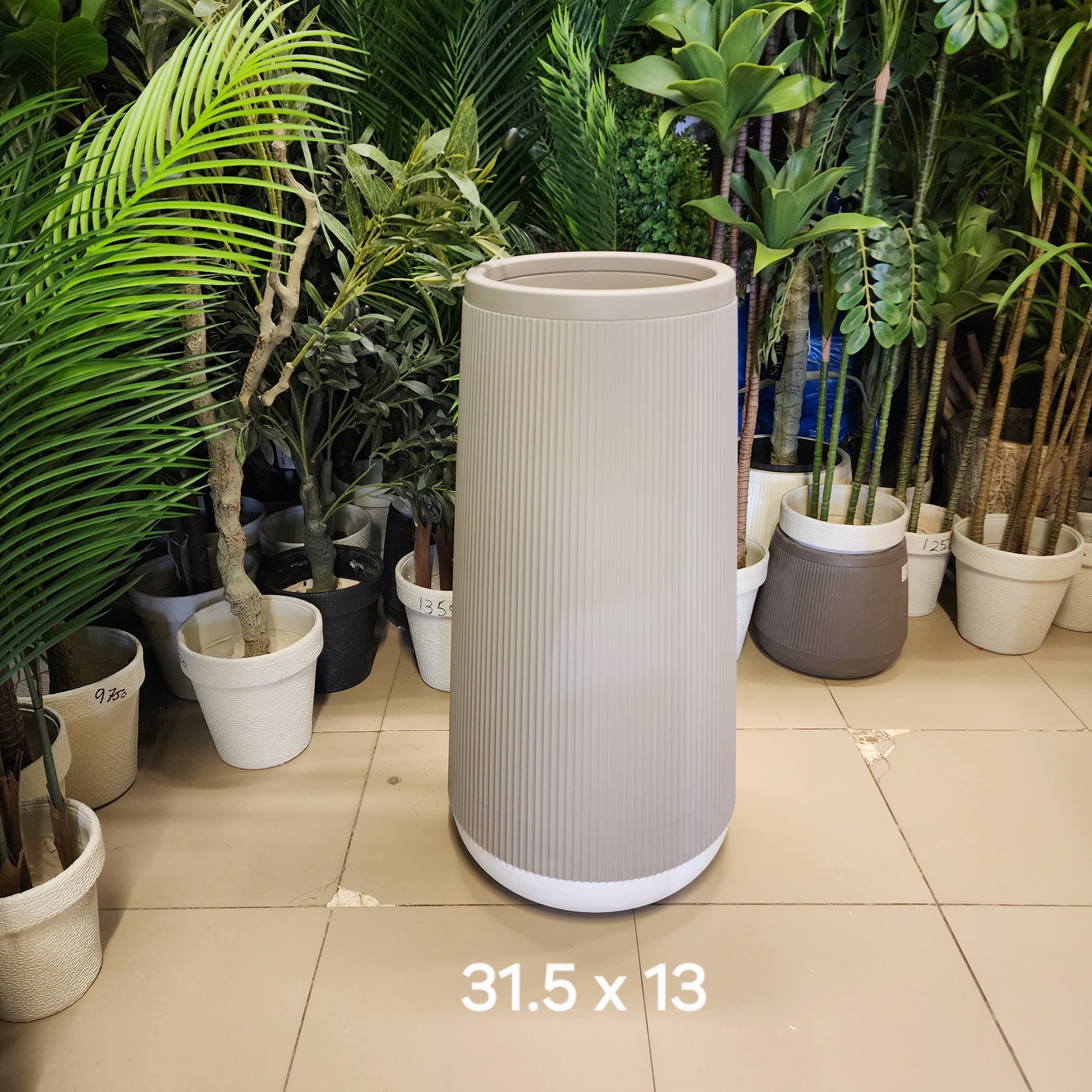 tall ribbed tapered cylinder planter