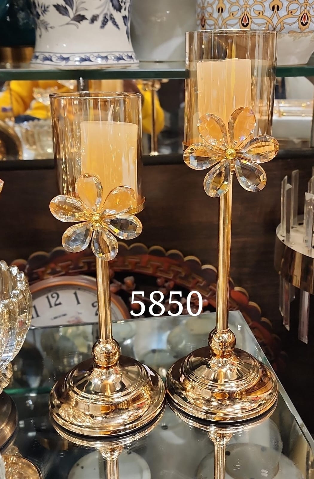 gold metal and crystal flower candle stands