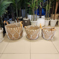 woven seagrass or jute planter baskets
