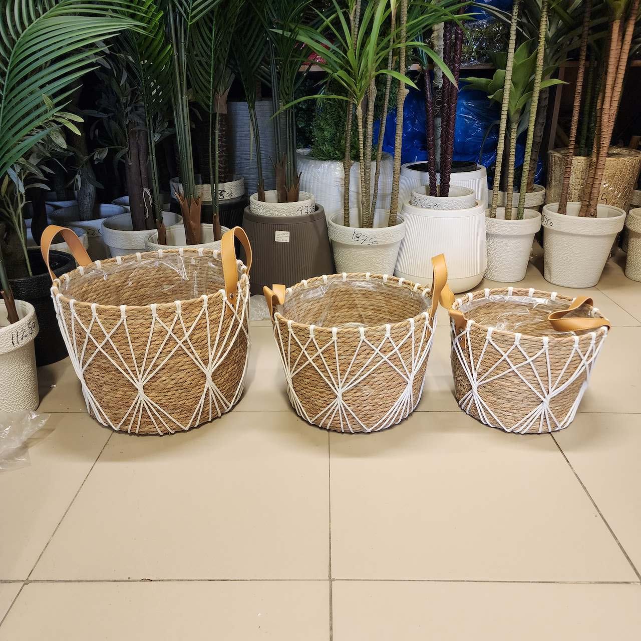 woven seagrass or jute planter baskets