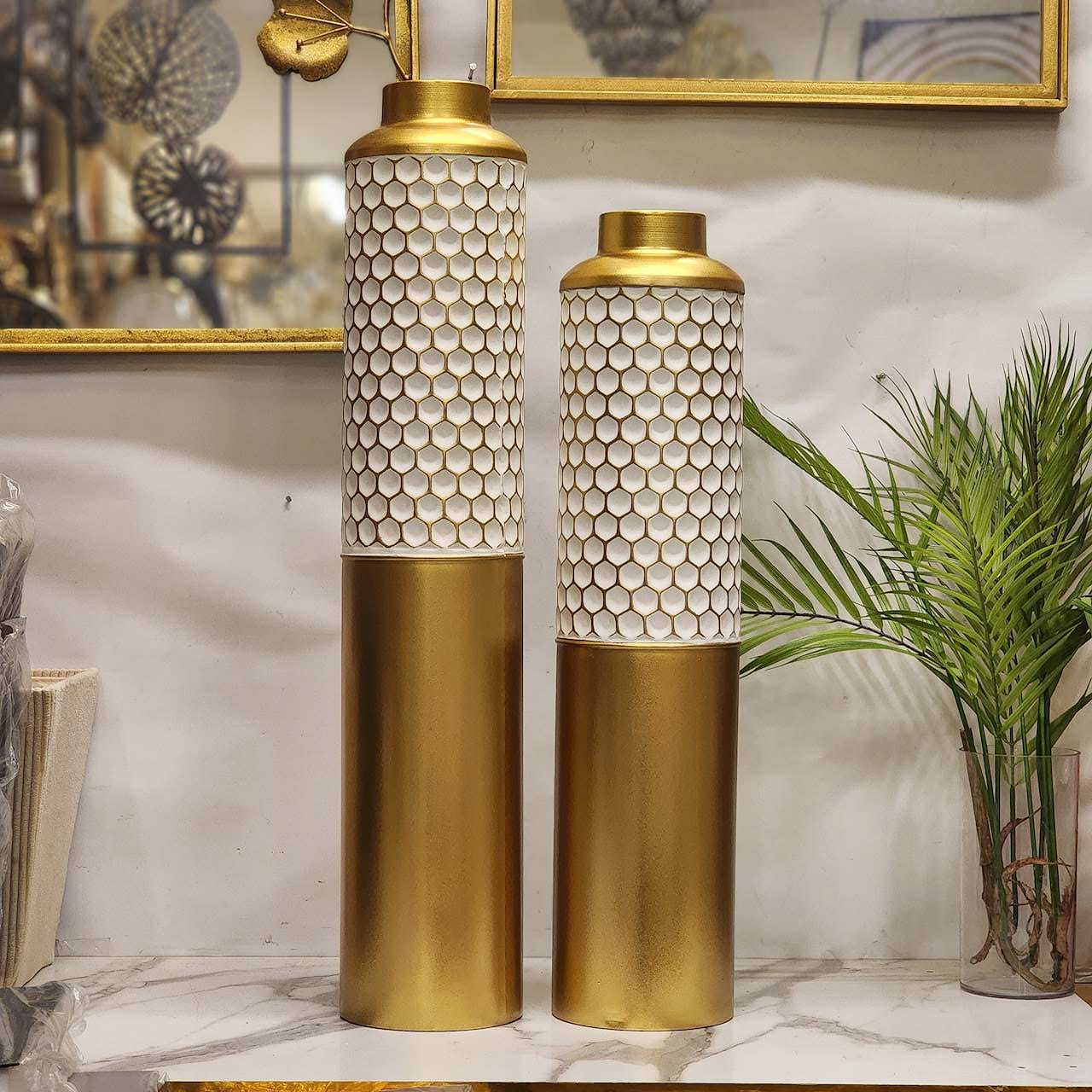 white and gold metallic floor vases