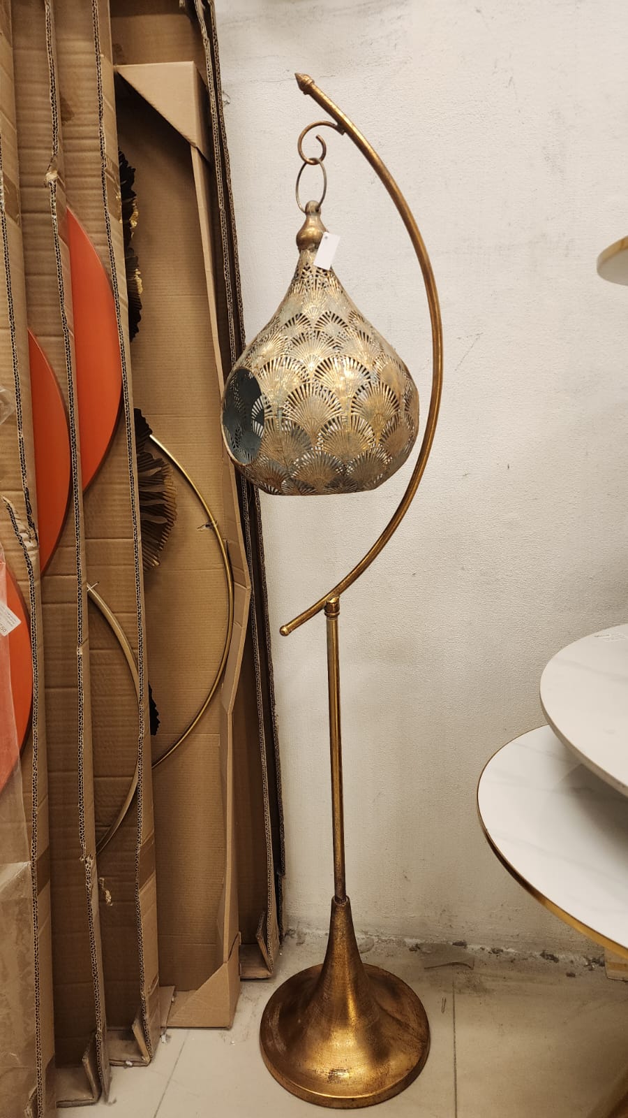 Moroccan-style floor lantern or a Hanging Pierced Metal Floor Lamp