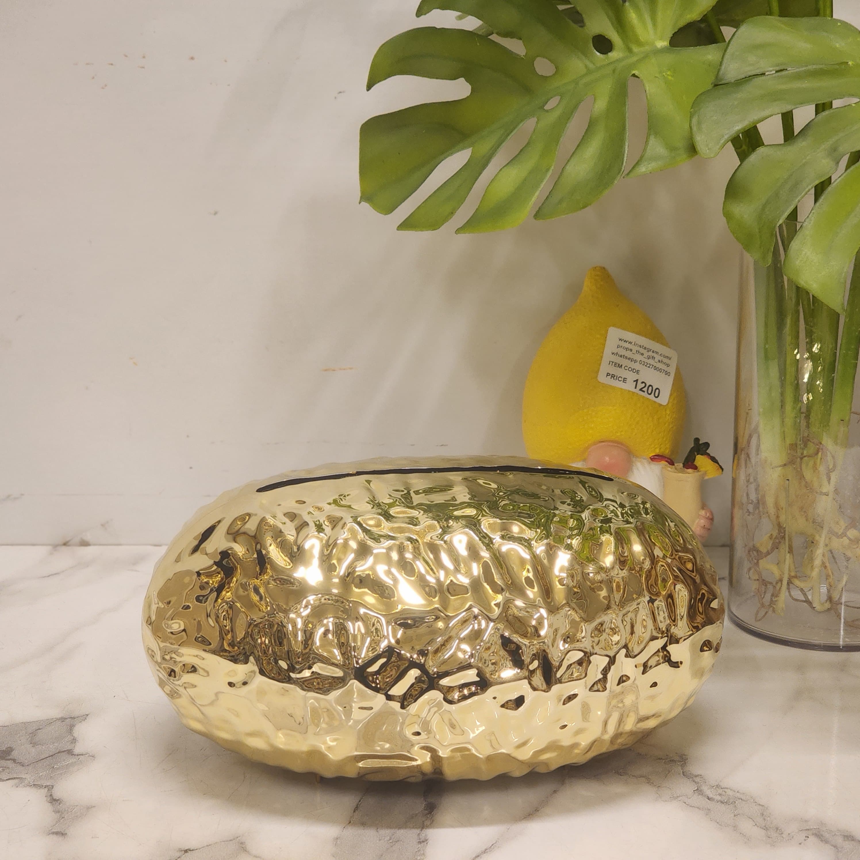 Metallic plastic pebble tissue holder