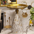 faux-marble and gold pedestal cake stand