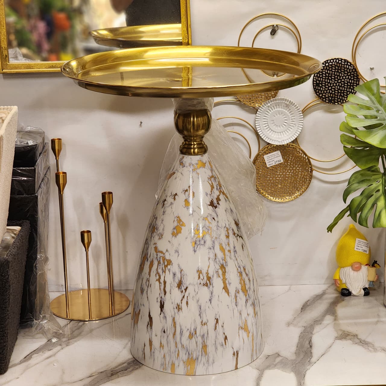 faux-marble and gold pedestal cake stand