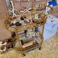 gold oval bar mirror trolley