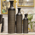 textured metal floor vases.