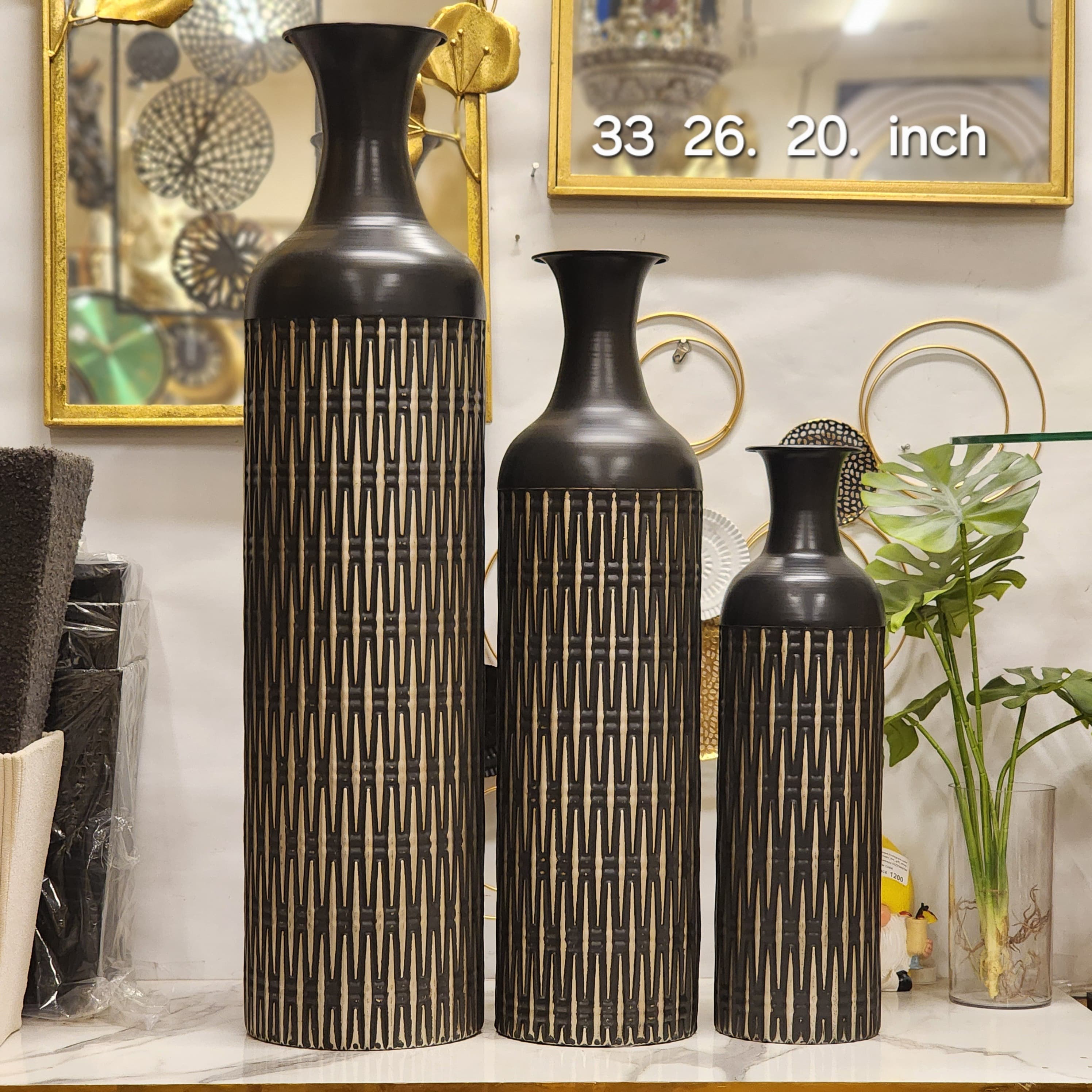 textured metal floor vases.