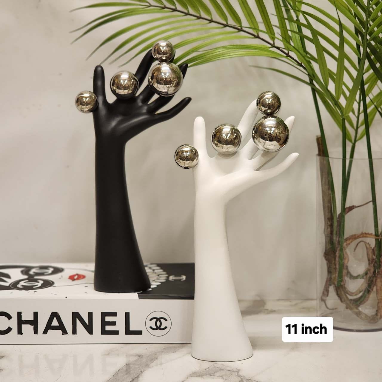 Modern Ceramic Hand Sculpture with Metallic Orbs