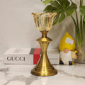 gold metal candlestick holder