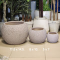 textured spherical or globe planters