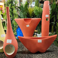 terracotta-colored ceramic vases