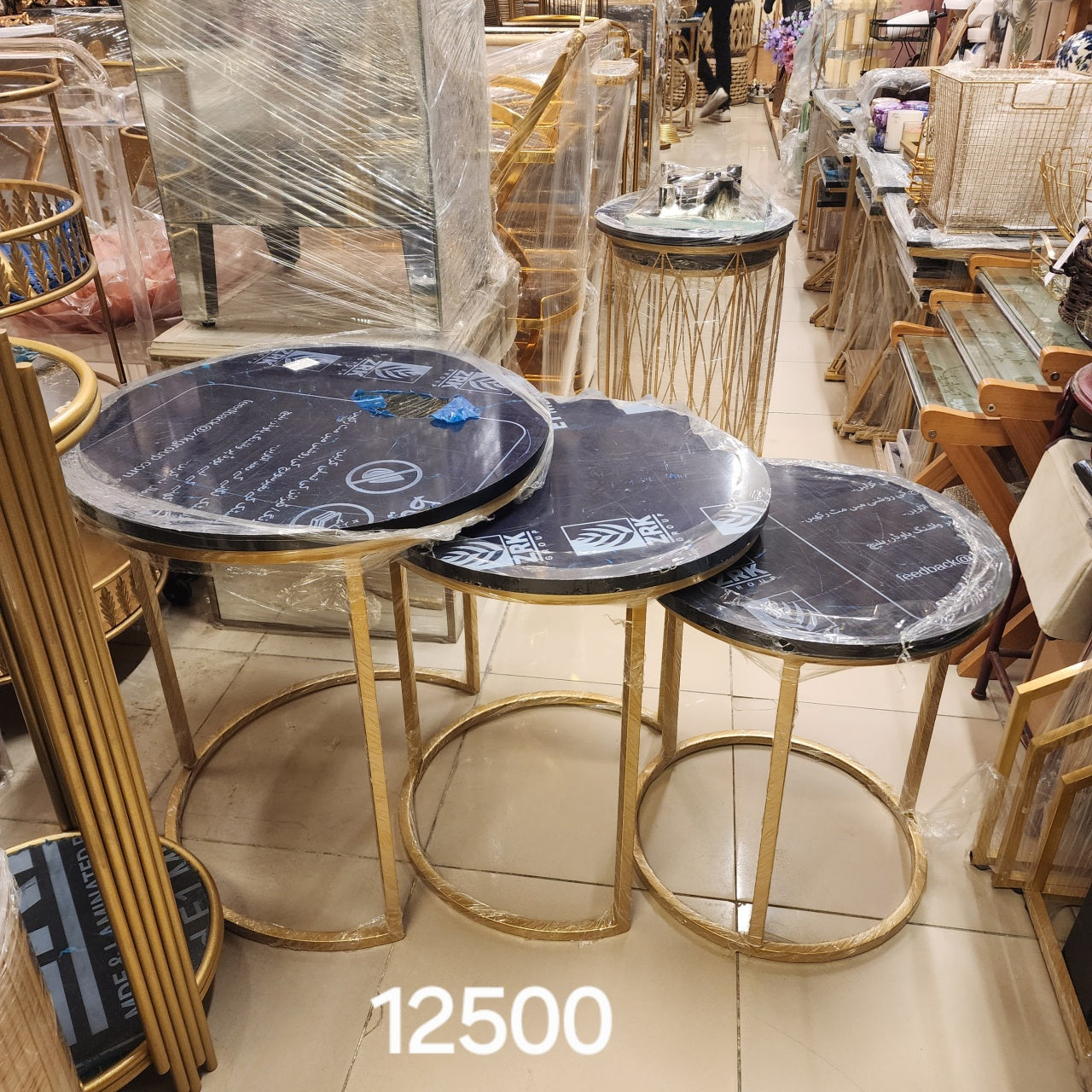 contemporary glam aesthetic nesting tables