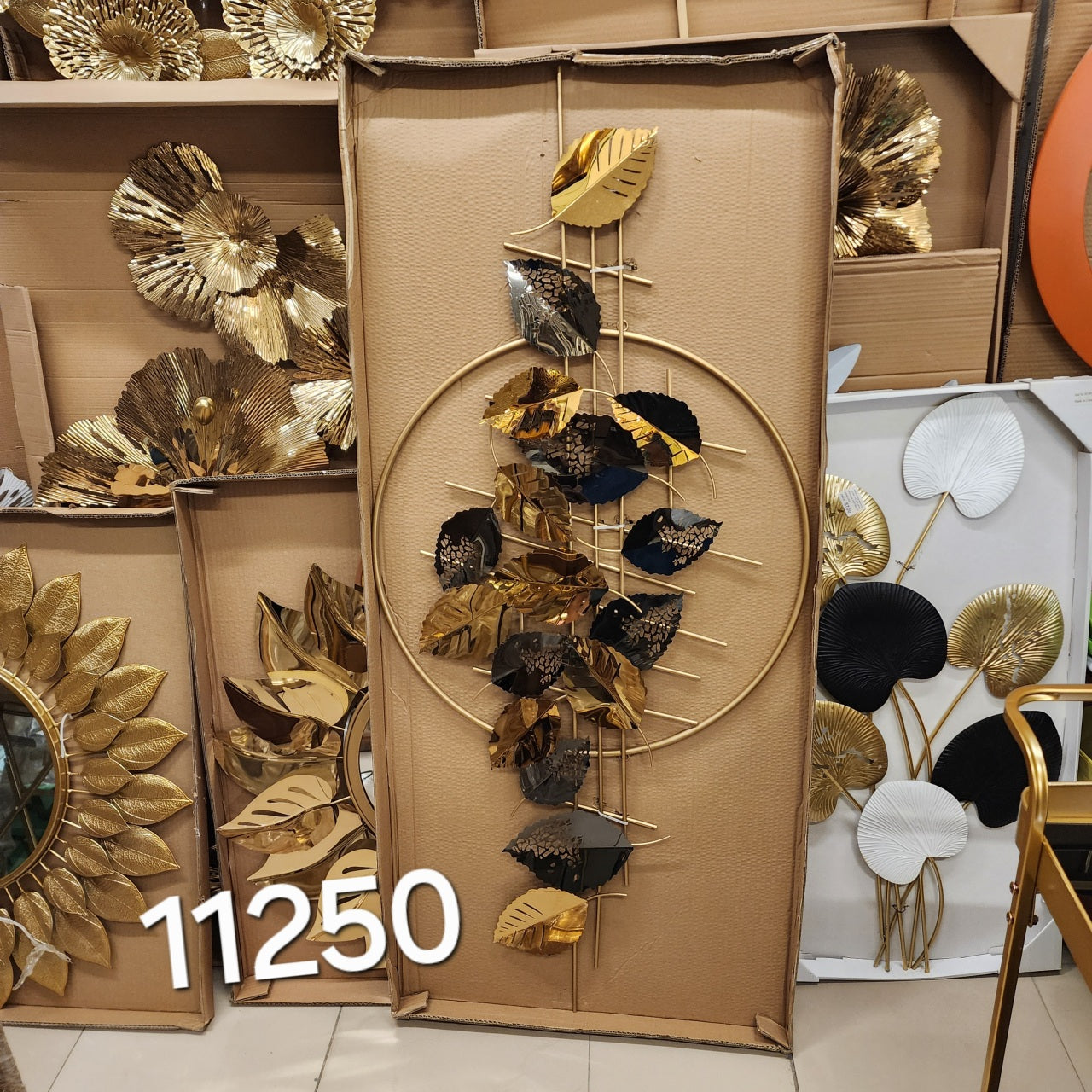Gold and black metal leaf wall art