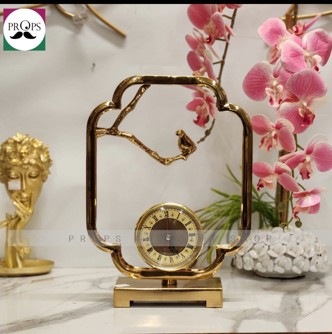 PROPS modern golden luxury brass bird table clock with a Roman numeral dial