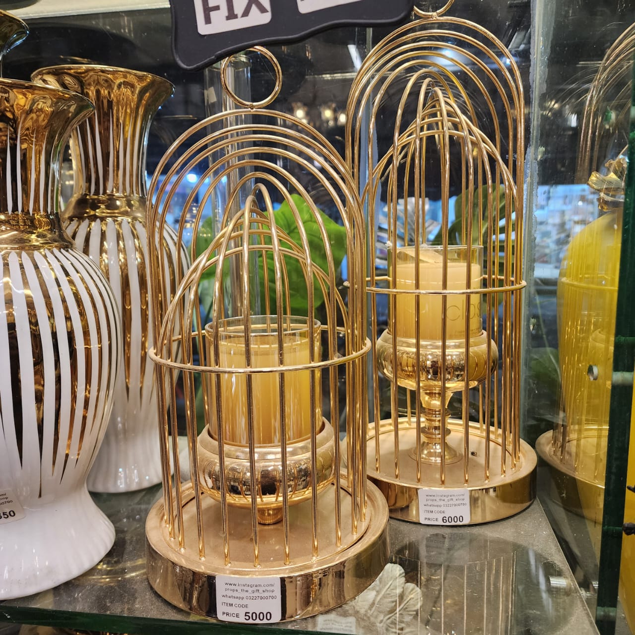 gold-finished cage candle stand