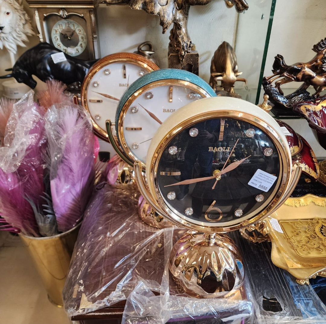 Props Baoli Premium Table Watch featuring a one-side mirror design and a luxury gold-toned finish.