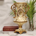 ornate vintage Baroque-style ceramic urn vase with gold scroll handles and floral crackle detailing