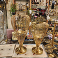 whisk-style pedestal candle holders