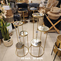 multi-tiered gold metal display stand
