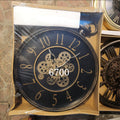 Props black and gold vintage-style wall clock