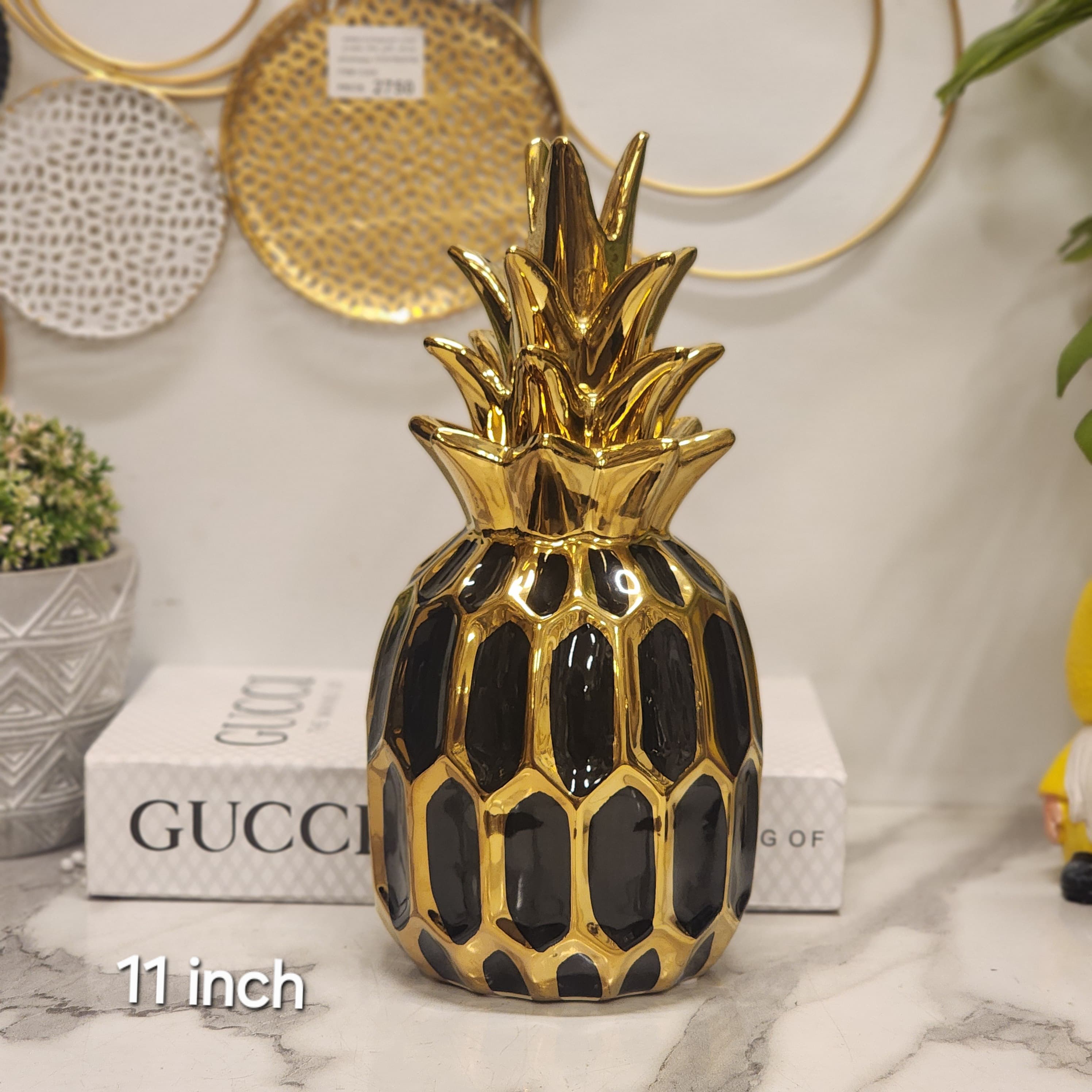 ceramic gold & black pineapple decor piece