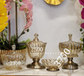 Fluted glass candy jars and a crystal lotus bowl