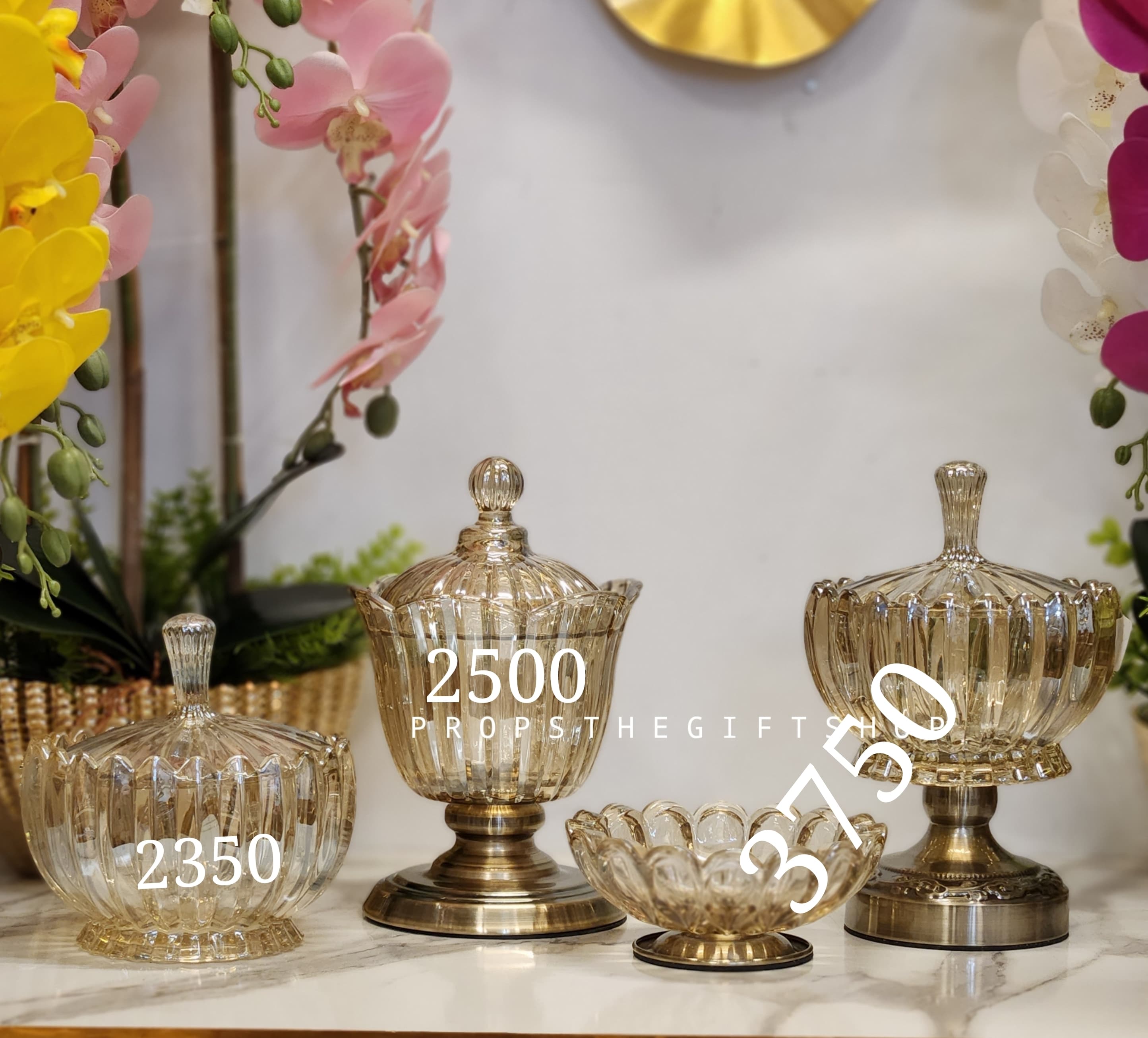 Fluted glass candy jars and a crystal lotus bowl