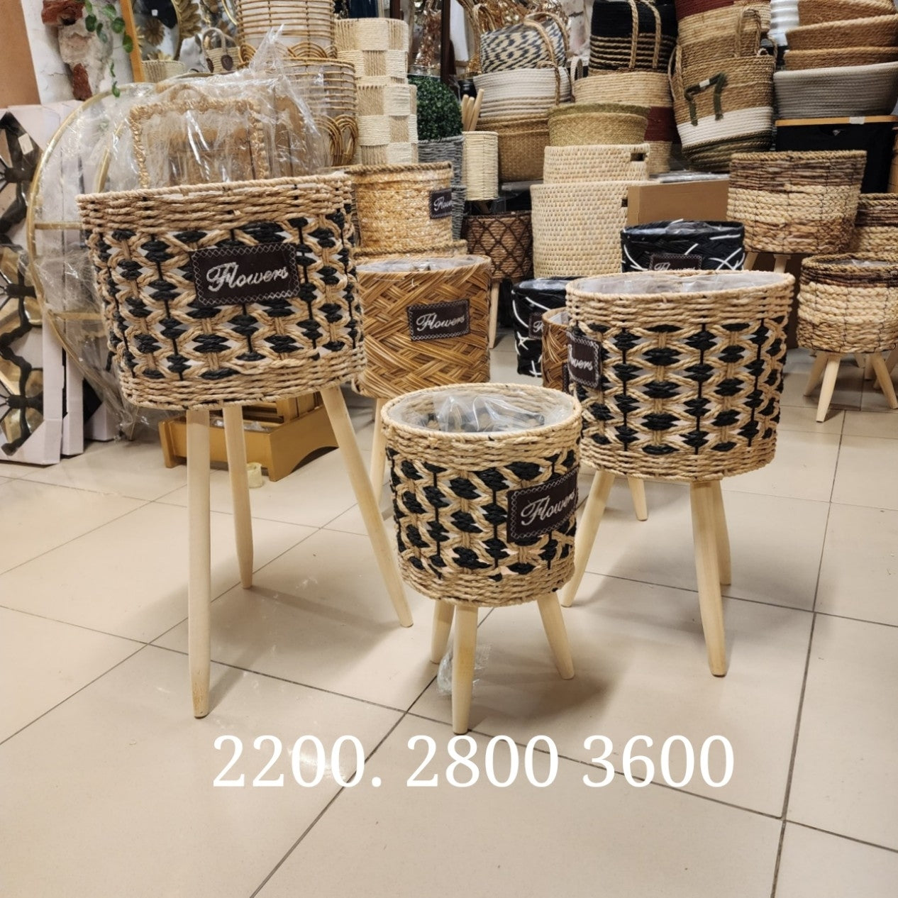 Basket planter with wooden tripod legs