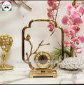 Props modern luxury brass metal bird desk clock.