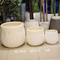 wavy-textured, barrel-shaped ceramic (or fiberglass) planters