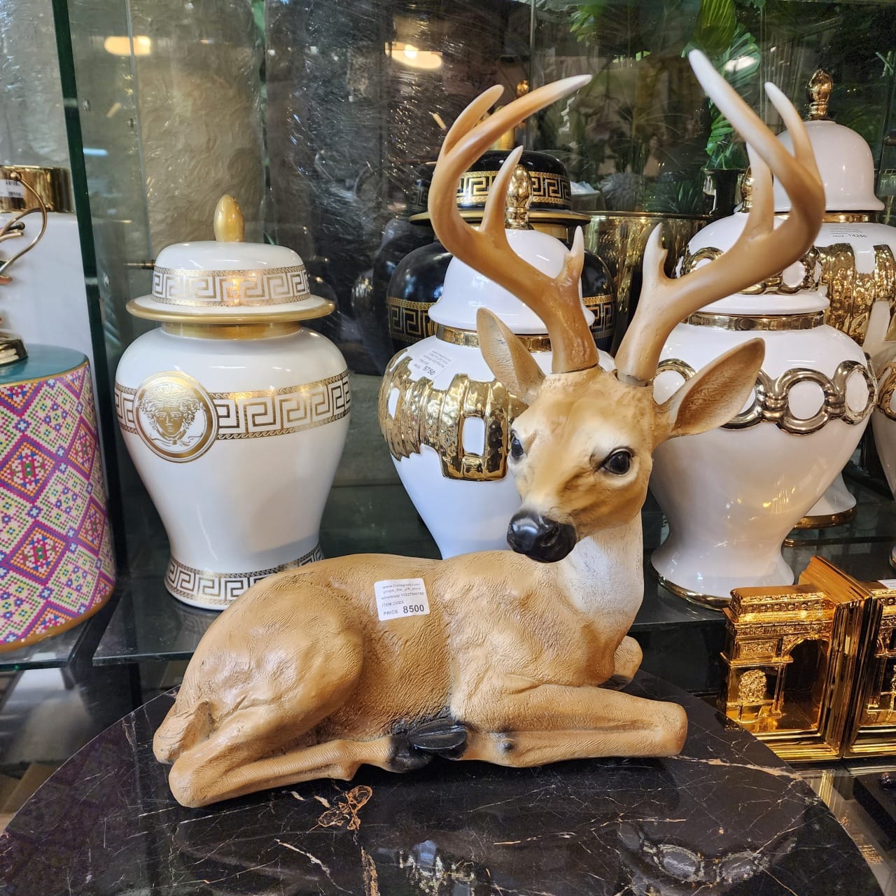 Sitting Deer Figurine with Antlers