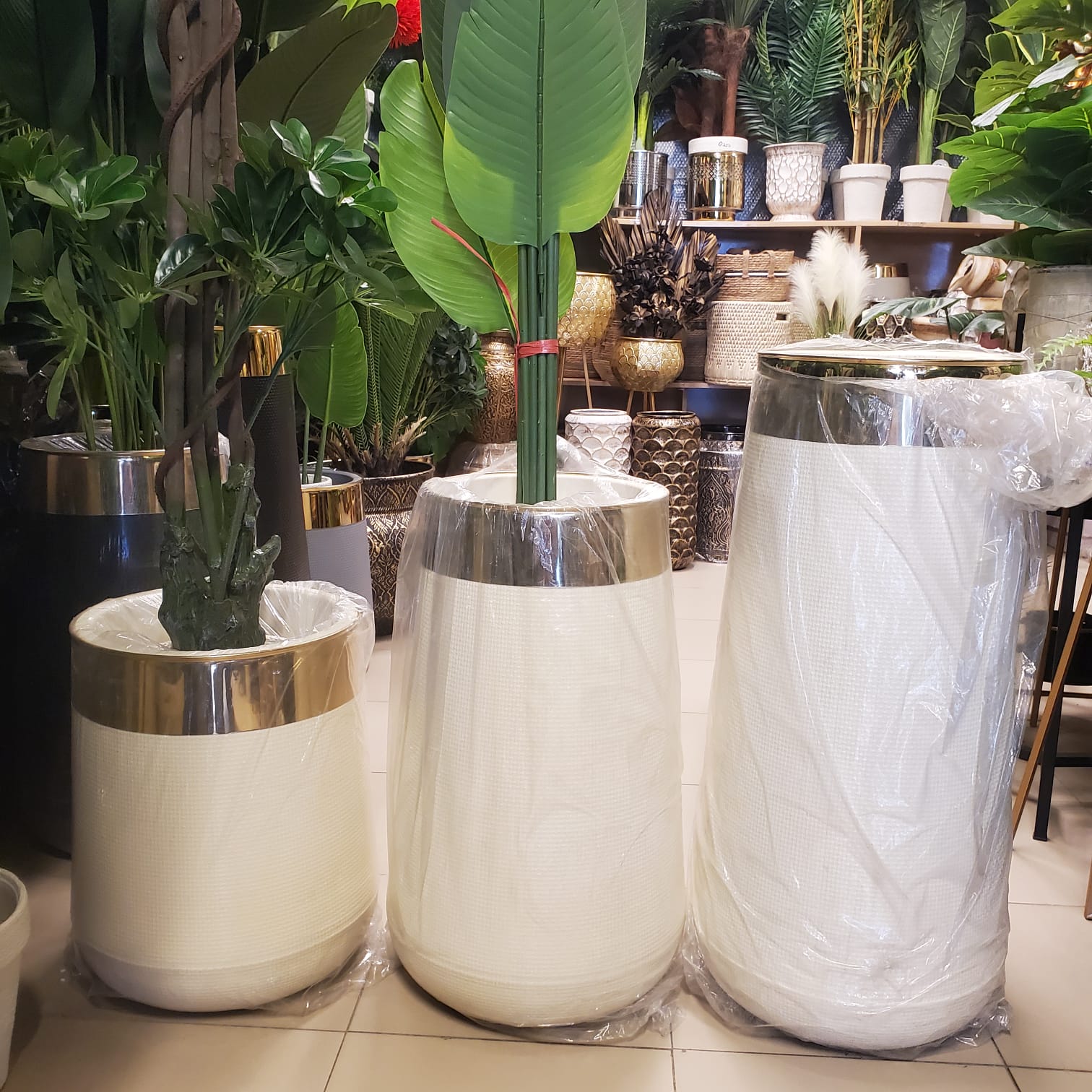 white and gold tapered floor planters