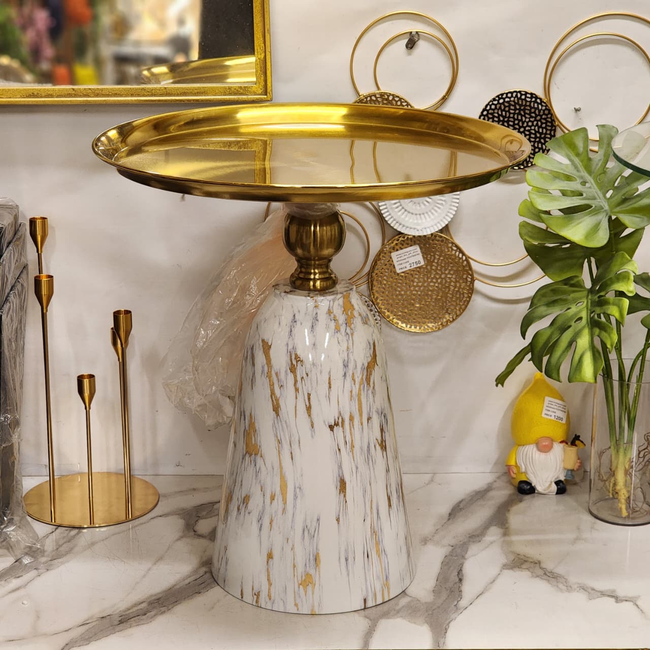 faux-marble and gold pedestal cake stand