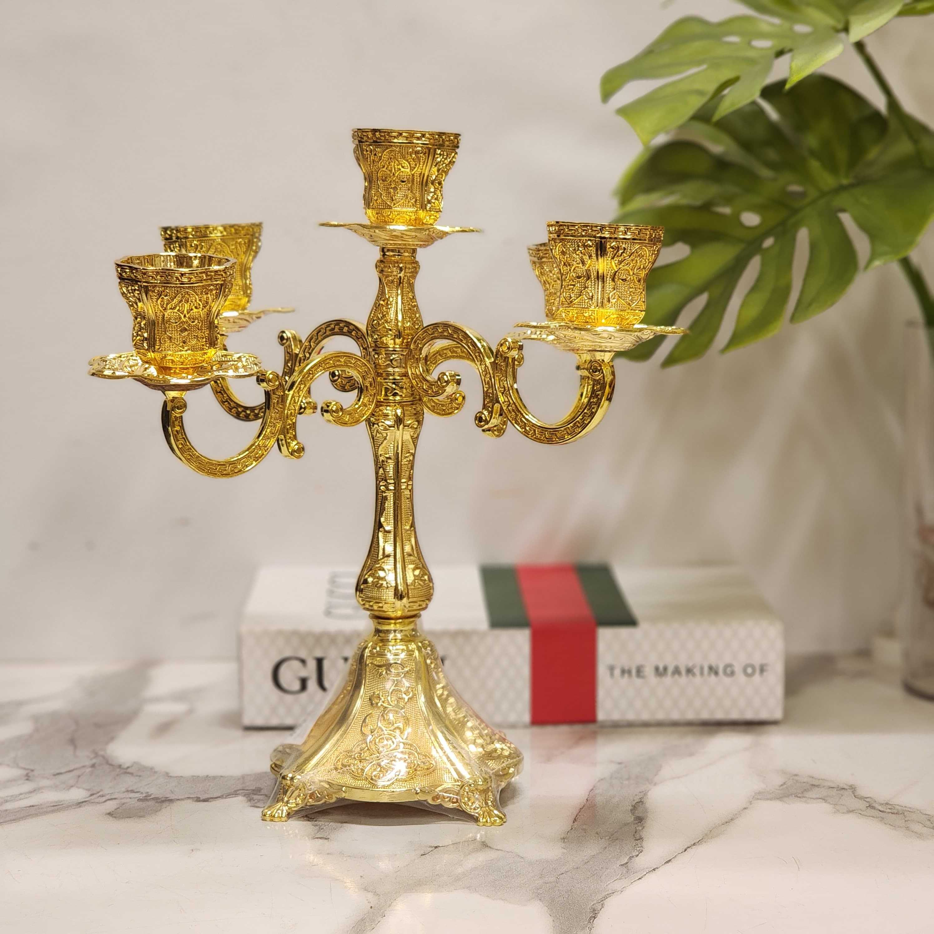 5-arm golden candelabra